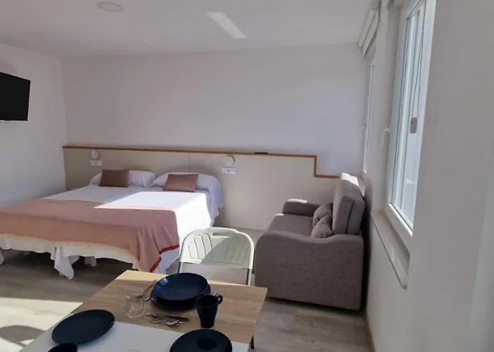 Апарт-отель Estudios En Plaza Cabo Da Centro 4*